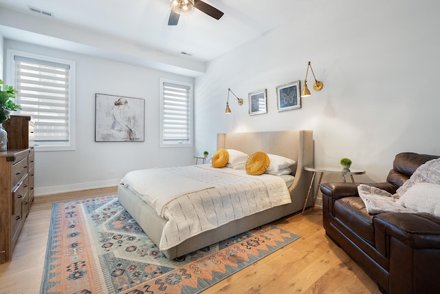 7929 N Octavia Ave, Niles, IL 60714 - bedroom featuring light wood-type flooring, baseboards, and ceiling fan