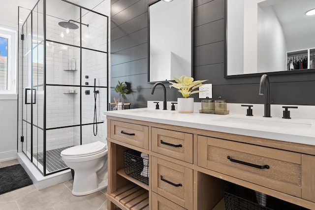 7929 N Octavia Ave, Niles, IL 60714 - bathroom featuring a shower stall, toilet, double vanity, and tile patterned flooring