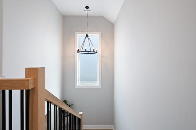 7929 N Octavia Ave, Niles, IL 60714 - stairway with a chandelier, lofted ceiling, and baseboards
