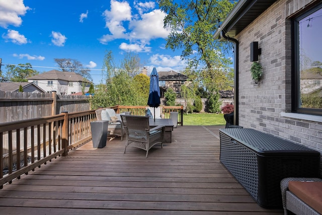 7929 N Octavia Ave, Niles, IL 60714 - wooden terrace with outdoor dining space and fence