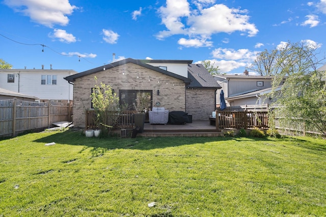 7929 N Octavia Ave, Niles, IL 60714 - rear view of house featuring a wooden deck and brick siding