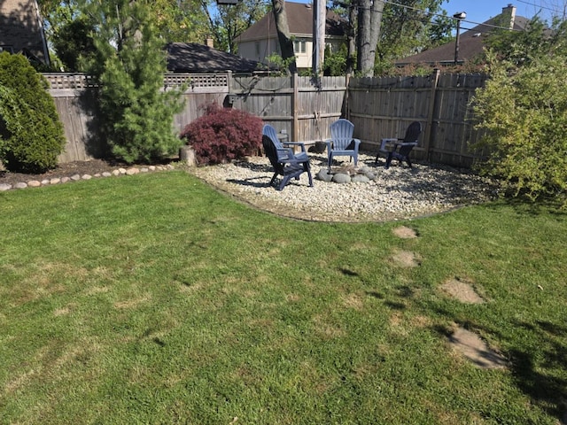 7929 N Octavia Ave, Niles, IL 60714 - view of yard with an outdoor fire pit and a patio area