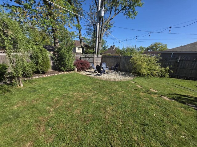 7929 N Octavia Ave, Niles, IL 60714 - view of yard featuring a fire pit