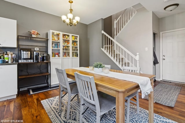 148 Azalea Cir Unit 0, Romeoville, IL 60446 - dining area featuring stairway, wood finished floors, and a chandelier