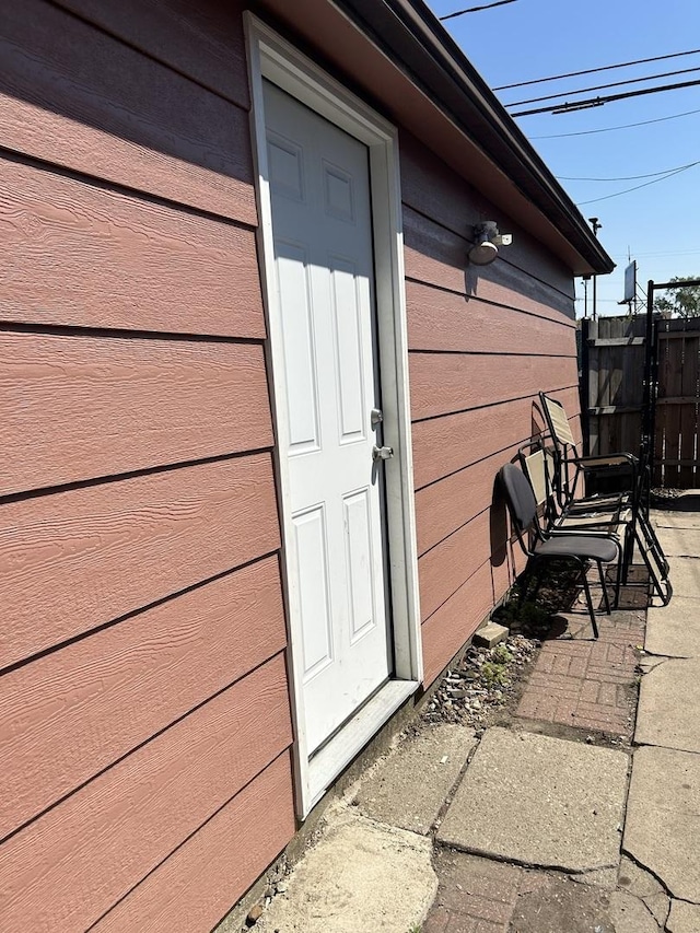 property entrance featuring fence