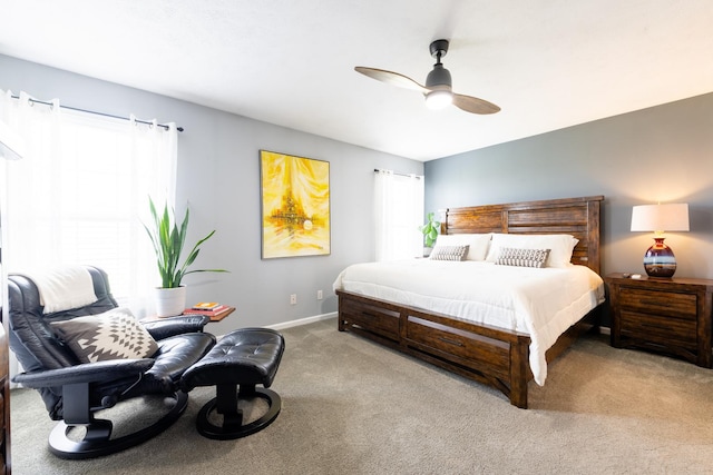 502 Deerpath St, Tolono, IL 61880 - carpeted bedroom featuring ceiling fan and baseboards