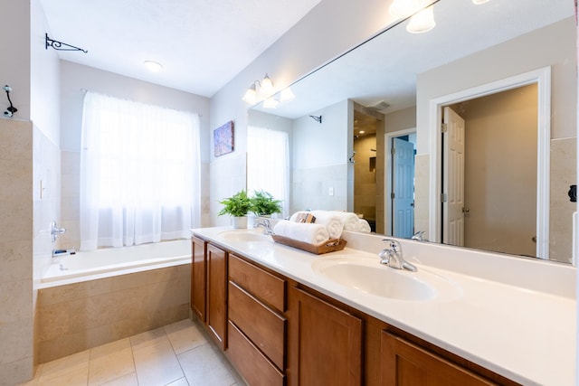 502 Deerpath St, Tolono, IL 61880 - full bath with tile patterned flooring, a bath, a tile shower, and double vanity