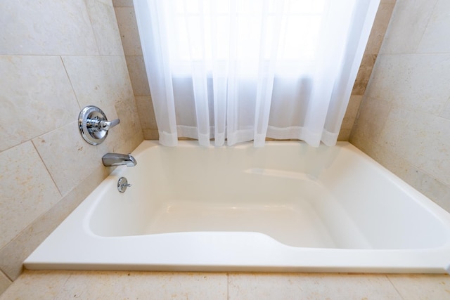 502 Deerpath St, Tolono, IL 61880 - full bathroom featuring a bathtub