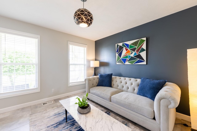502 Deerpath St, Tolono, IL 61880 - living room featuring baseboards