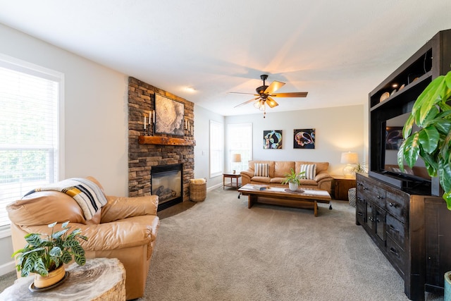 502 Deerpath St, Tolono, IL 61880 - carpeted living area featuring a ceiling fan and a fireplace
