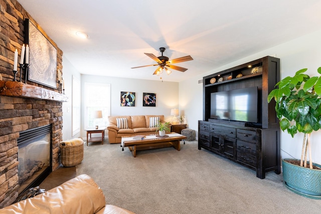 502 Deerpath St, Tolono, IL 61880 - carpeted living room featuring a ceiling fan and a fireplace