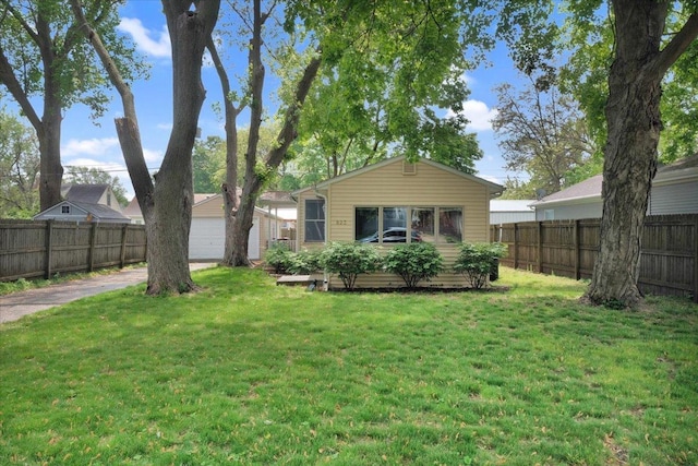 back of house featuring a garage