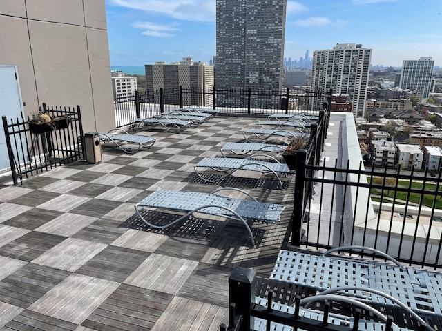 720 W Gordon Ter Unit 4A, Chicago, IL 60613 - wooden deck with a view of city