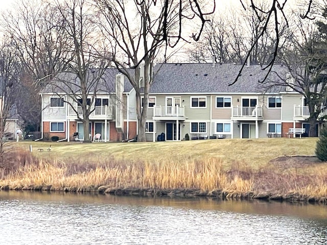 1510 Seville Ct Unit A1, Wheeling, IL 60090 - back of property featuring a water view and a yard