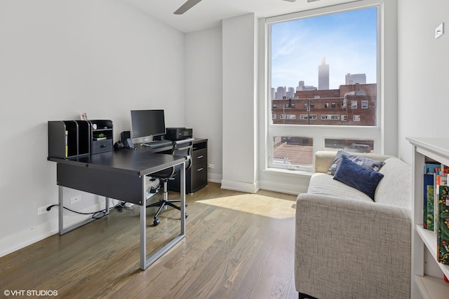 236 S Racine Ave Unit 304, Chicago, IL 60607 - home office with wood finished floors, baseboards, and a ceiling fan