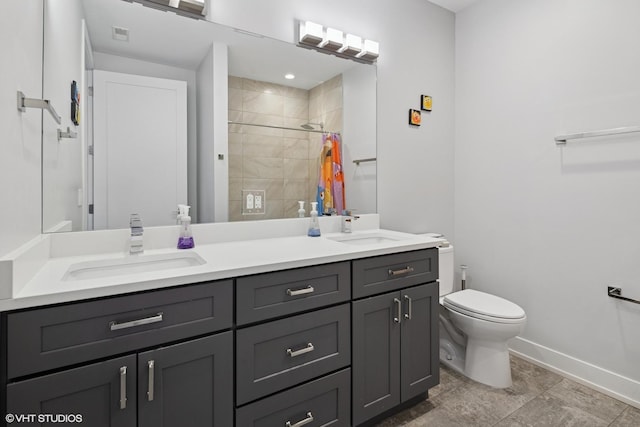 236 S Racine Ave Unit 304, Chicago, IL 60607 - full bathroom with toilet, a tile shower, baseboards, and double vanity