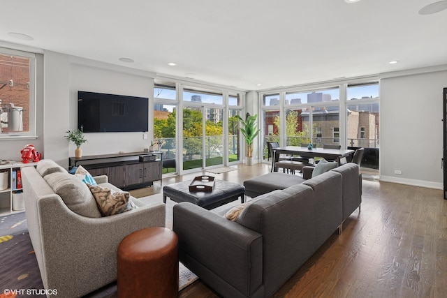 236 S Racine Ave Unit 304, Chicago, IL 60607 - living room featuring wood finished floors, plenty of natural light, floor to ceiling windows, recessed lighting, and baseboards