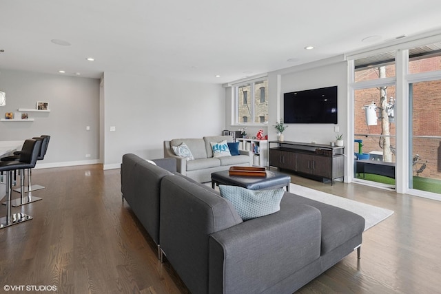 236 S Racine Ave Unit 304, Chicago, IL 60607 - living area with dark wood-type flooring, recessed lighting, and baseboards
