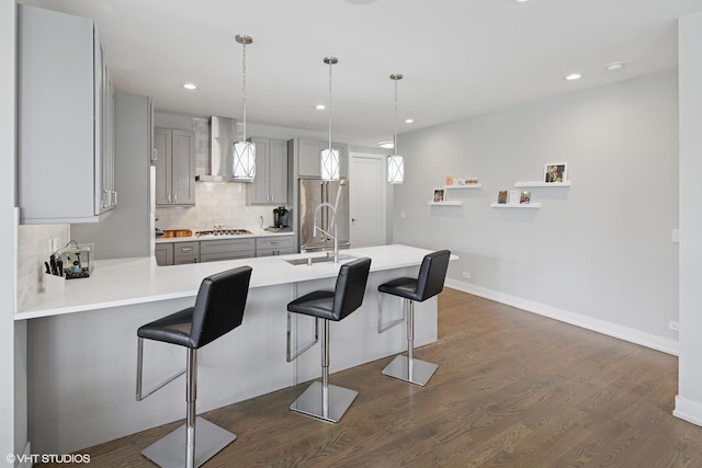 236 S Racine Ave Unit 304, Chicago, IL 60607 - kitchen with gray cabinets, appliances with stainless steel finishes, a sink, dark wood-style floors, and backsplash