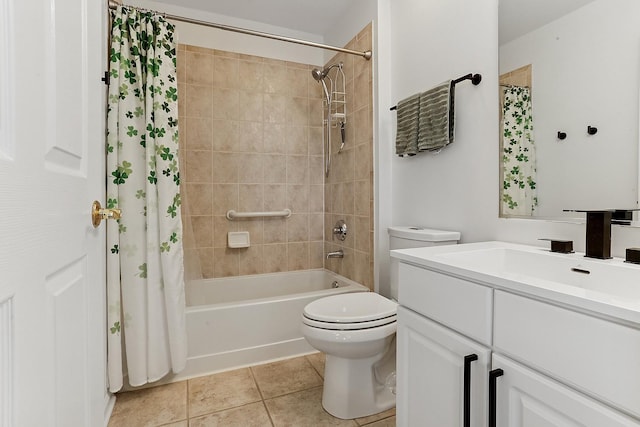 full bathroom with toilet, shower / tub combo, tile patterned floors, and vanity
