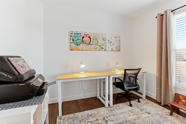office featuring wood finished floors and baseboards