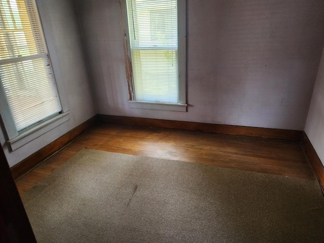 931 S Nelson Ave, Kankakee, IL 60901 - unfurnished room with wood finished floors and baseboards