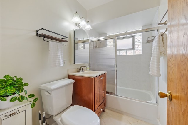 full bathroom with toilet, vanity, tile patterned floors, and enclosed tub / shower combo