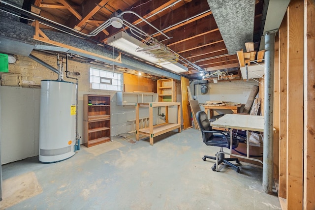 below grade area featuring water heater