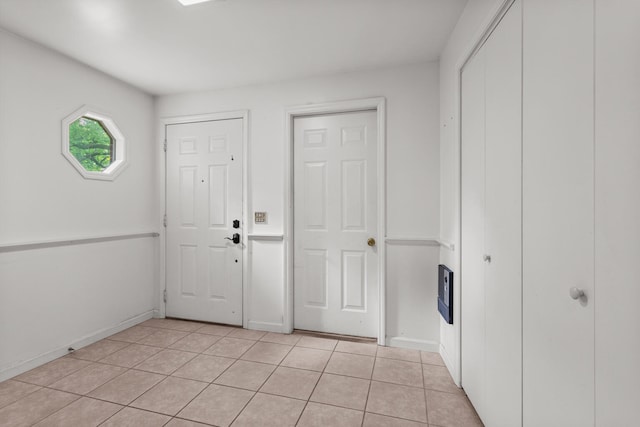 911 S Hamilton St, Monticello, IL 61856 - entrance foyer with light tile patterned flooring and baseboards
