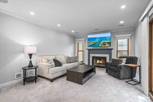 1070 Hobble Bush Ln, Elgin, IL 60120 - carpeted living room with a lit fireplace, ornamental molding, recessed lighting, and baseboards
