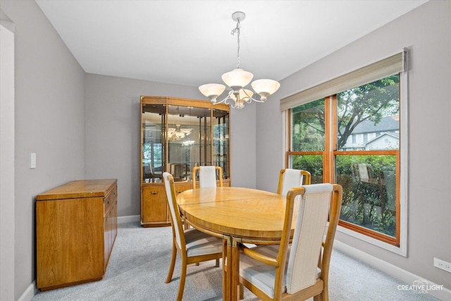 1070 Hobble Bush Ln, Elgin, IL 60120 - dining area with a chandelier, light colored carpet, and baseboards