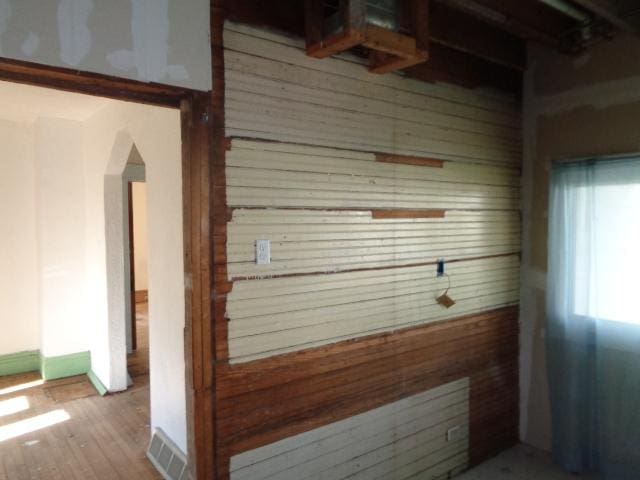 308 Genoa St, Cherry Valley, IL 61016 - garage featuring wooden walls