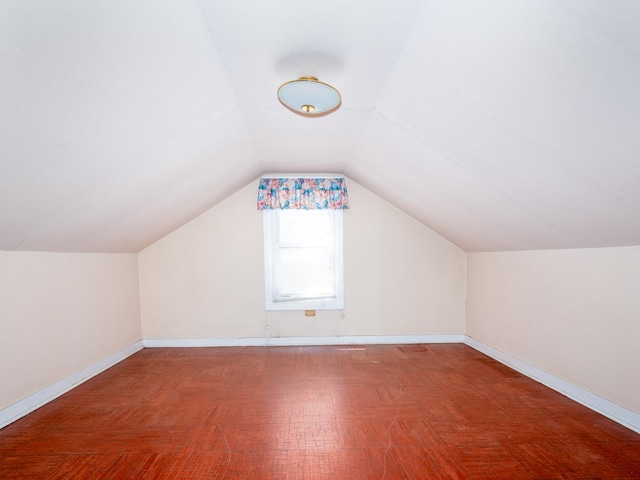4949 W Deming Pl, Chicago, IL 60639 - bonus room featuring lofted ceiling and baseboards