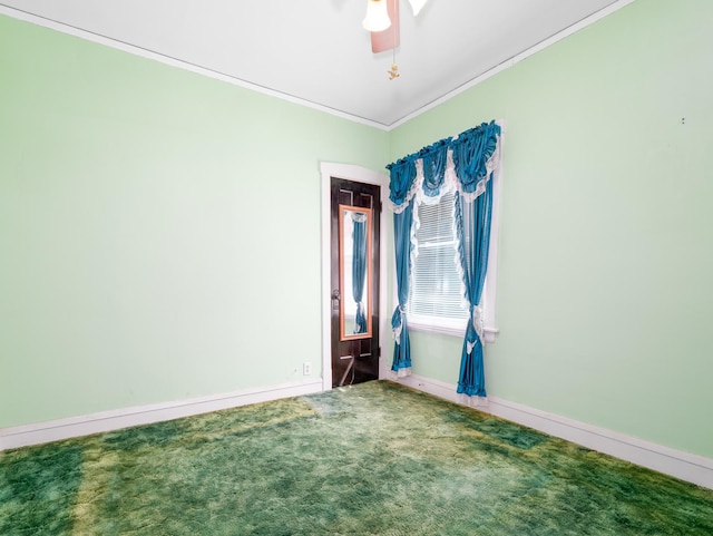 4949 W Deming Pl, Chicago, IL 60639 - carpeted empty room with crown molding, baseboards, and a ceiling fan