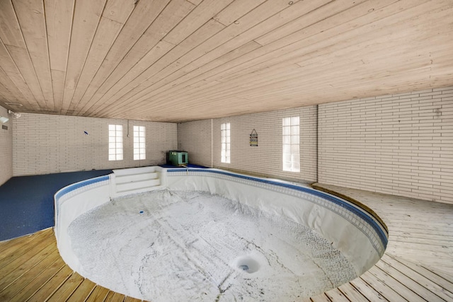 32381 N Forest Dr, Grayslake, IL 60030 - view of swimming pool with central AC unit and a jacuzzi