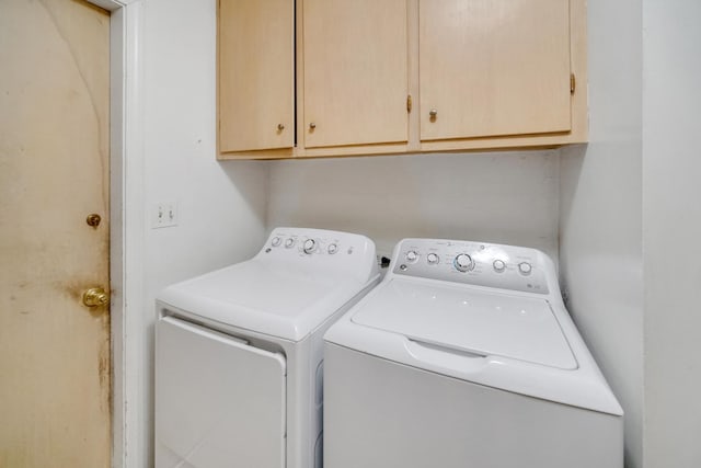 32381 N Forest Dr, Grayslake, IL 60030 - laundry room featuring washer and dryer and cabinet space
