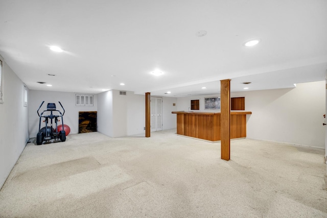 32381 N Forest Dr, Grayslake, IL 60030 - finished basement with bar, light colored carpet, and recessed lighting