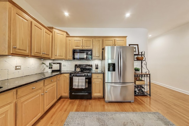 kitchen featuring black appliances, light wood-type flooring, tasteful backsplash, baseboards, and recessed lighting