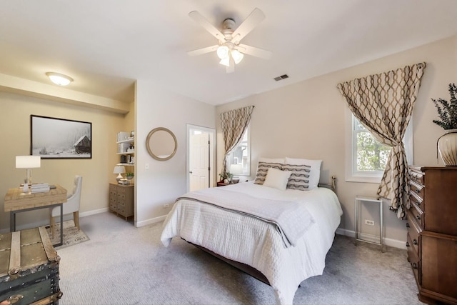 bedroom with carpet floors, baseboards, and a ceiling fan