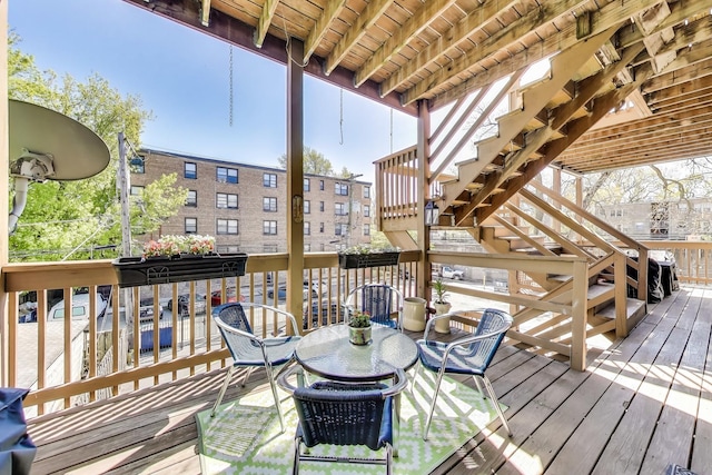 wooden terrace featuring stairway