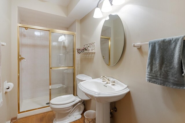 6 Old Timber Ln, Palos Park, IL 60464 - bathroom featuring a shower stall, toilet, and wood finished floors