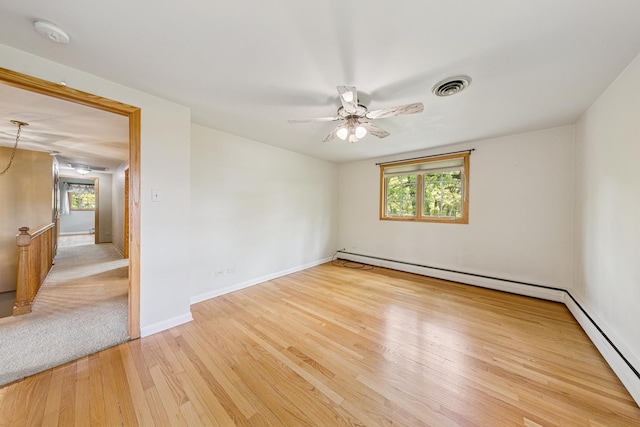 6 Old Timber Ln, Palos Park, IL 60464 - spare room with plenty of natural light, wood finished floors, a ceiling fan, and baseboards