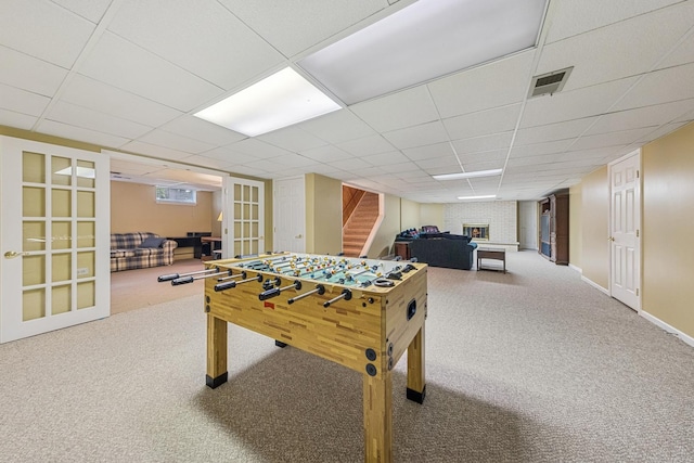 6 Old Timber Ln, Palos Park, IL 60464 - playroom featuring carpet floors, french doors, a drop ceiling, and baseboards