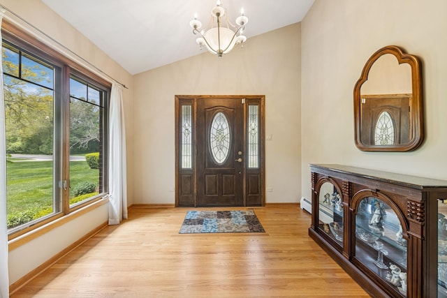 6 Old Timber Ln, Palos Park, IL 60464 - entryway with a chandelier, healthy amount of natural light, lofted ceiling, light wood-style flooring, and baseboards
