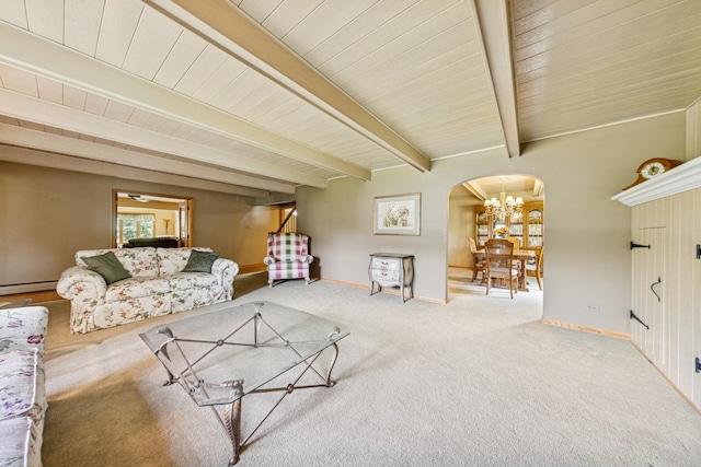 6 Old Timber Ln, Palos Park, IL 60464 - living area featuring arched walkways, beam ceiling, carpet floors, baseboard heating, and baseboards