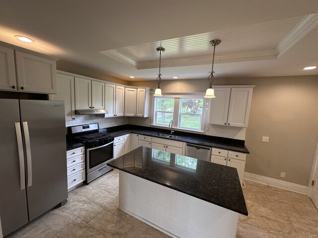 1527 7th St, Peru, IL 61354 - kitchen with stainless steel appliances, a raised ceiling, a sink, crown molding, and recessed lighting