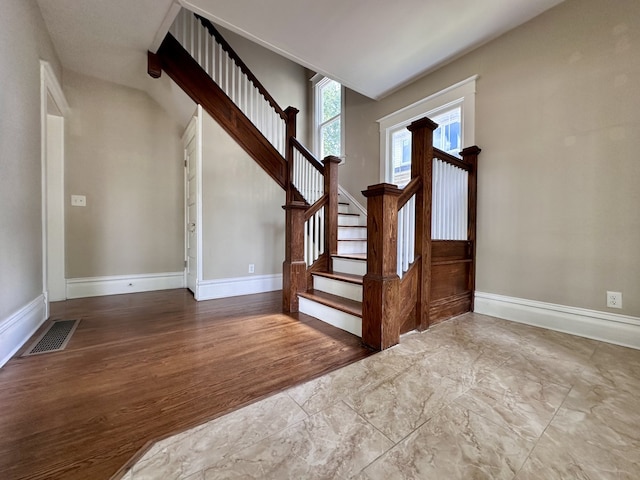 1527 7th St, Peru, IL 61354 - staircase with baseboards and wood finished floors