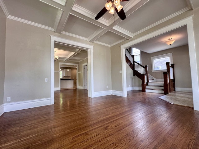 1527 7th St, Peru, IL 61354 - unfurnished living room featuring coffered ceiling, ceiling fan, dark wood-style flooring, stairs, and ornamental molding
