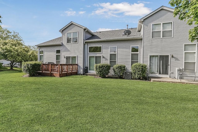 111 Woodland Cir, North Aurora, IL 60542 - rear view of property featuring a wooden deck, a lawn, and roof with shingles