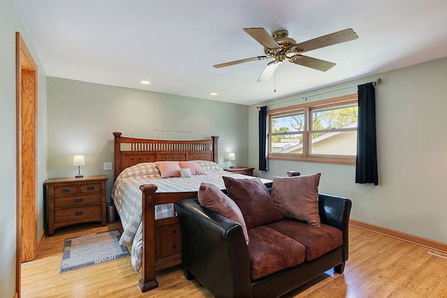 bedroom with light wood finished floors, baseboards, a ceiling fan, and recessed lighting